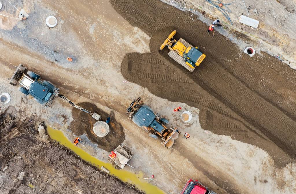 Aerial shot of mining truicks.