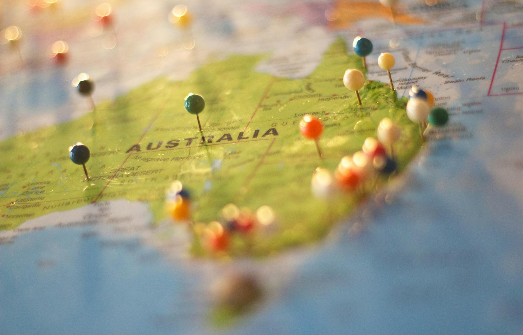 Australia Map with pins in it for people to point out where they would like to go on their working holiday visa