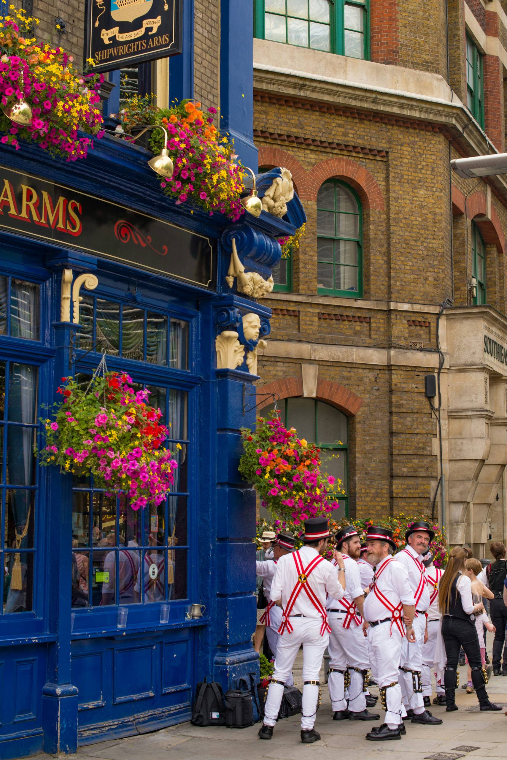 Men drinking at an English pub.