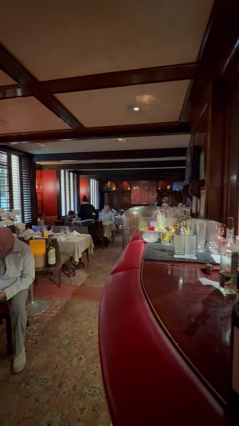 The wood-panelled dining room and bar at the House of Prime Rib