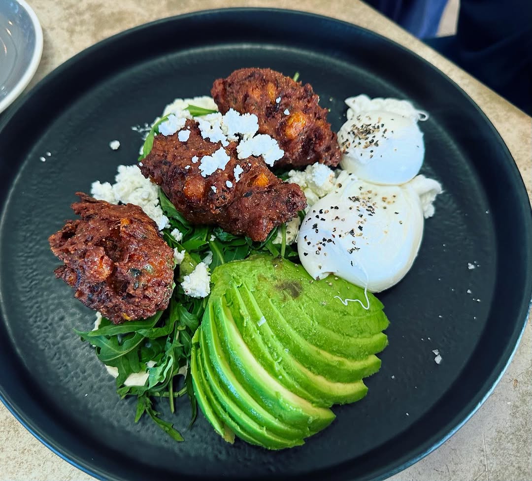 Instagram post featuring OAR's crispy patties with poached eggs and avocado