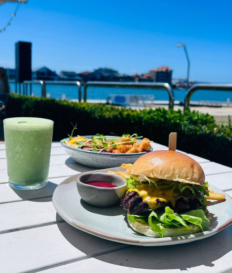 Lakeside dining experience with fresh food and drinks at OAR