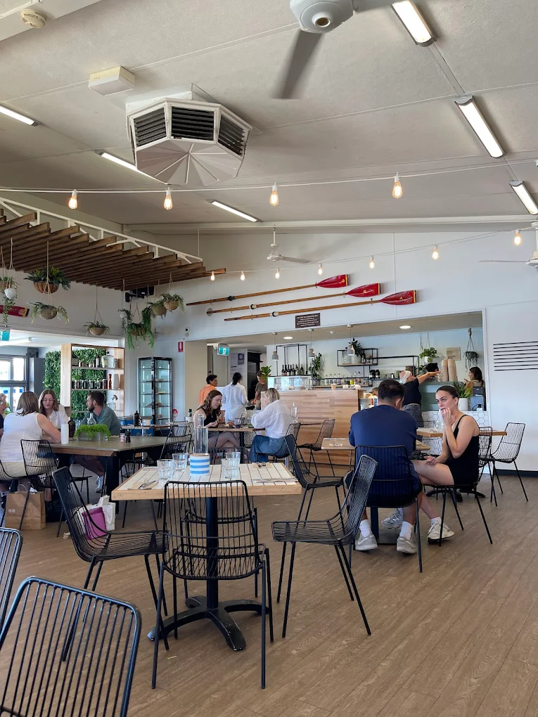 OAR restaurant interior with string lights and modern dining ambiance