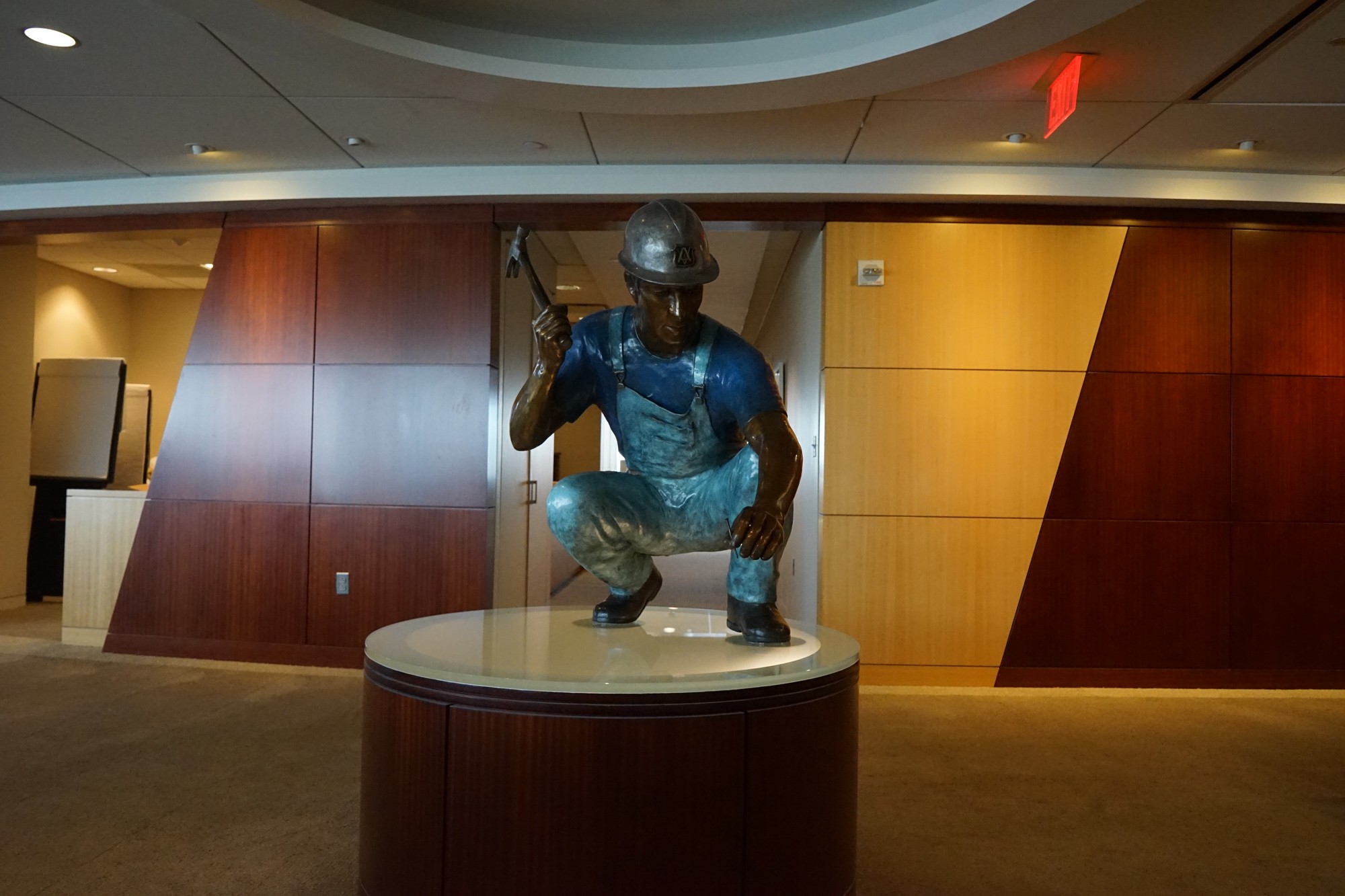 Corporate bronze sculpture installation backdrop