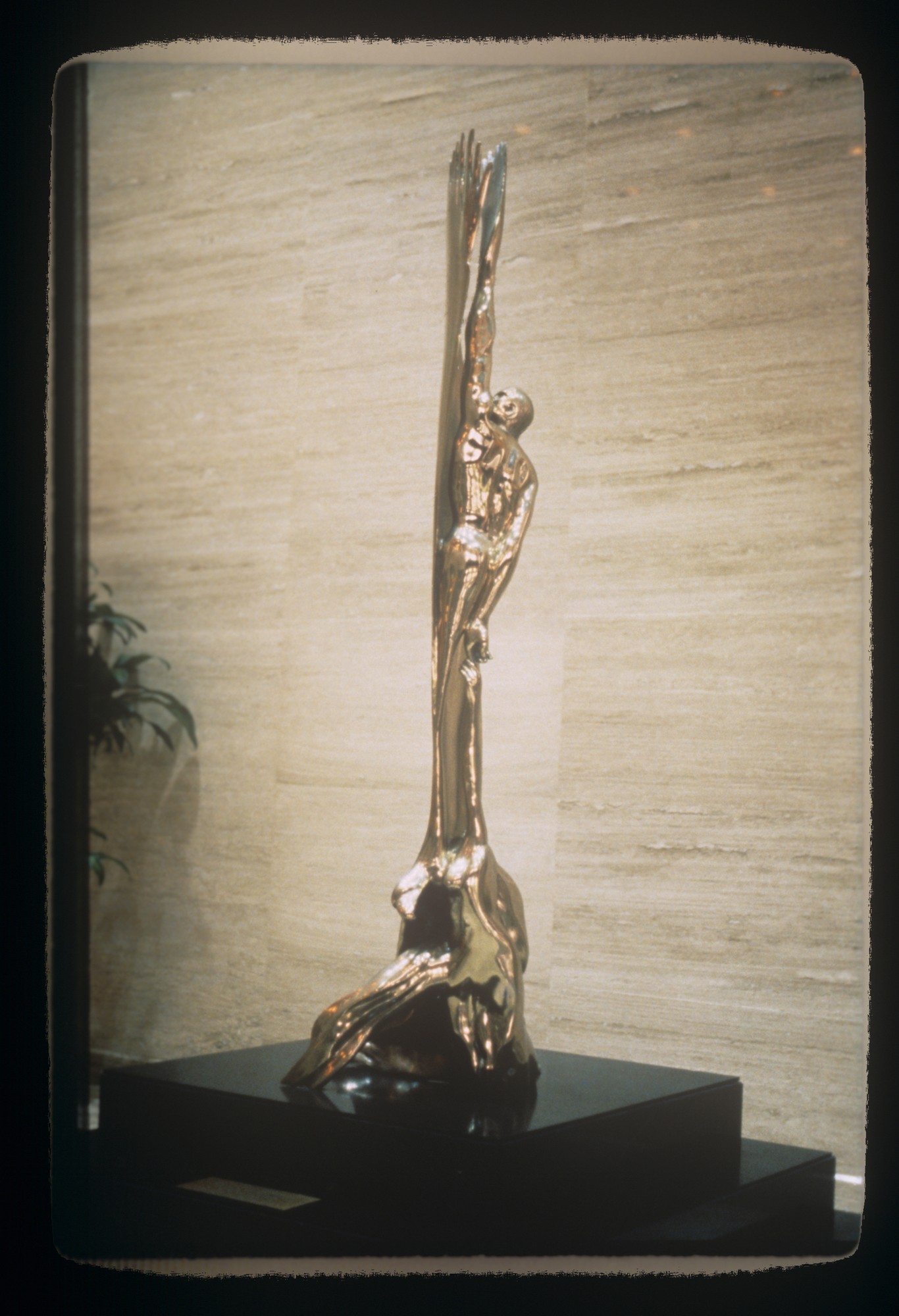 Elegant bronze sculpture with flowing human form