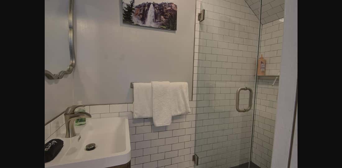Bathroom sink and shower in Unit 331