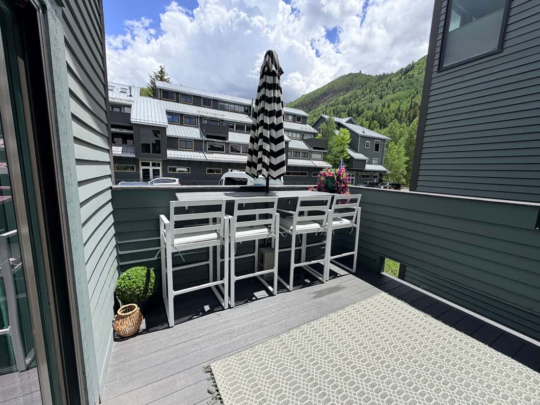 Private deck seating with mountain views at Unit 331