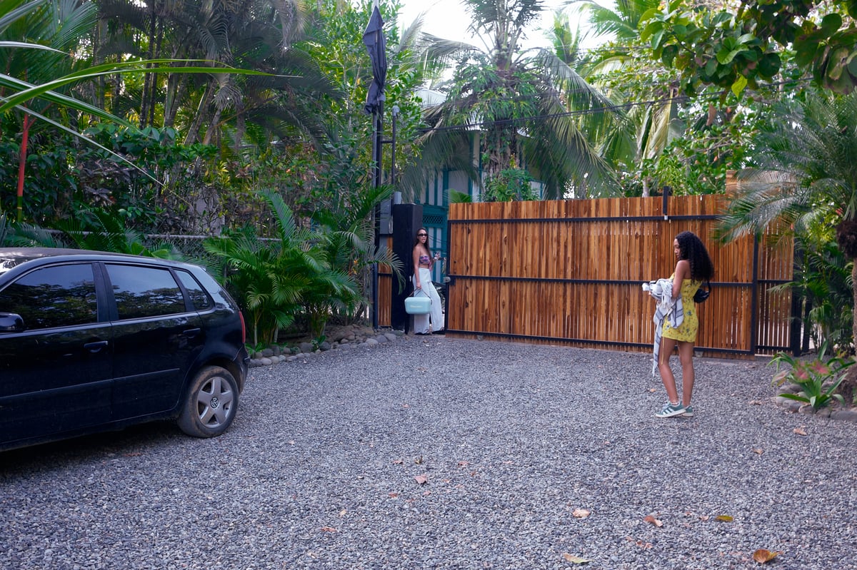 Arriving at Wabi Sabi Residences wooden gate entrance