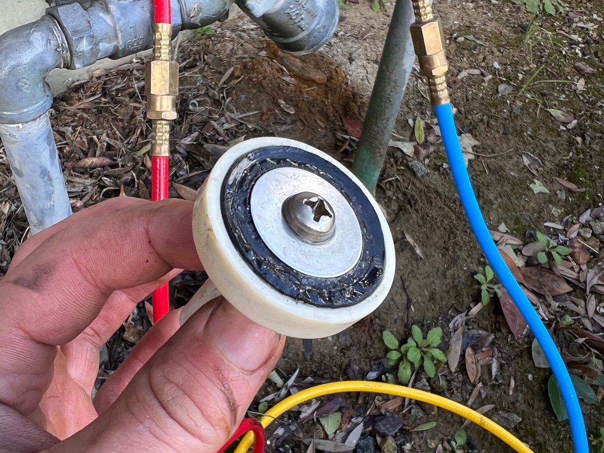 Worn backflow preventer disc — same-day repair part replacement