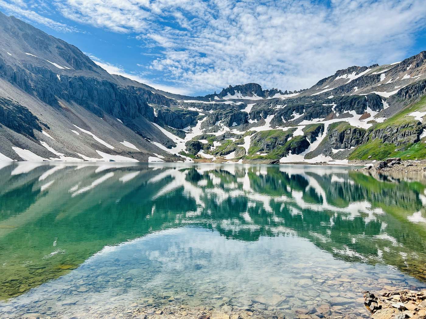 High-country water and ridgelines above Telluride, the kind of scenery you get without buying a lift ticket.