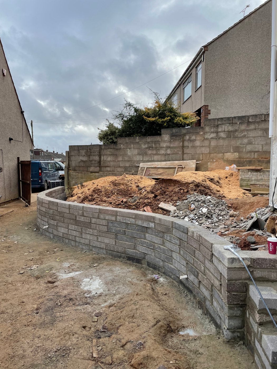 Blockwork garden wall under construction