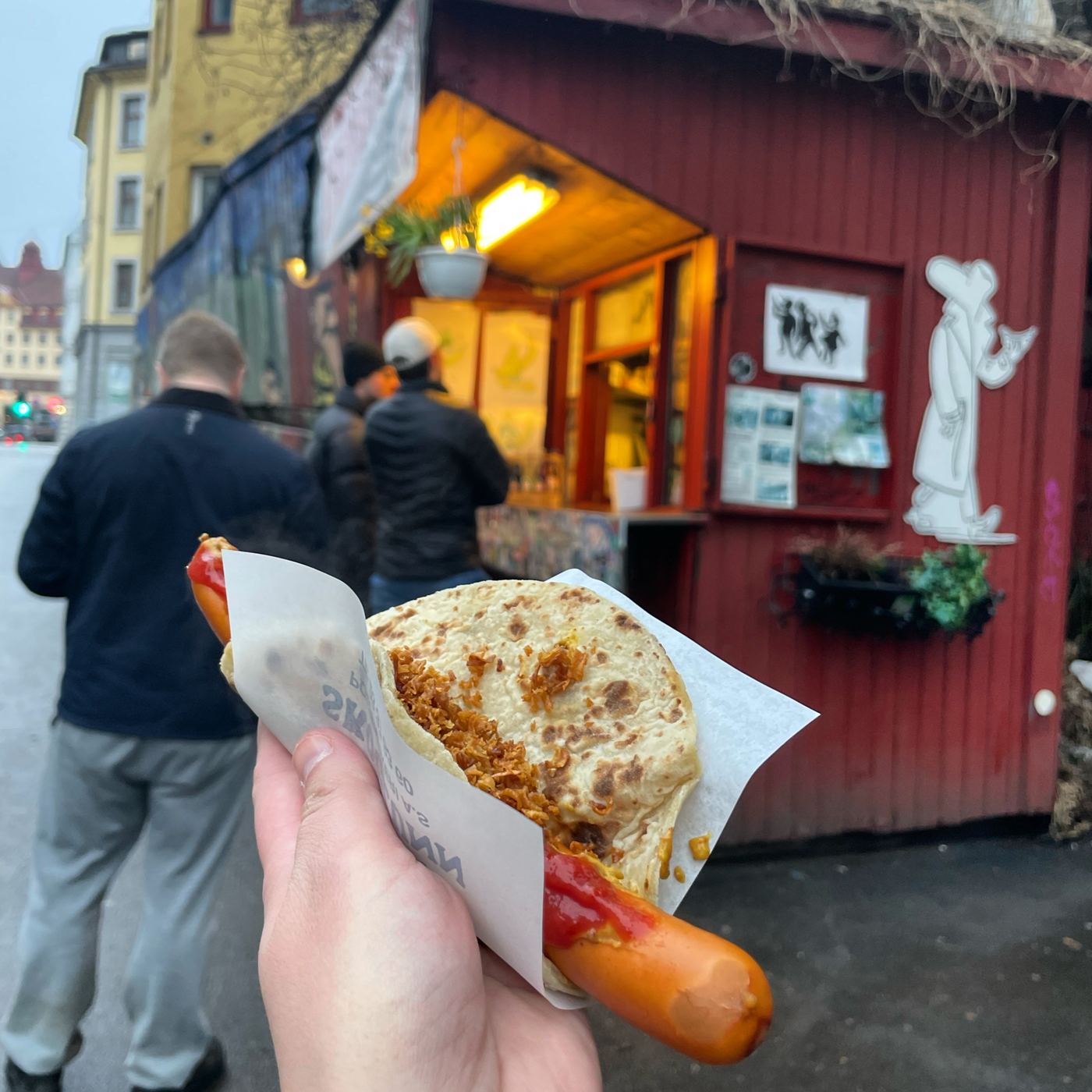 A Norwegian hot dog in a lompe potato wrap, bought from a street kiosk