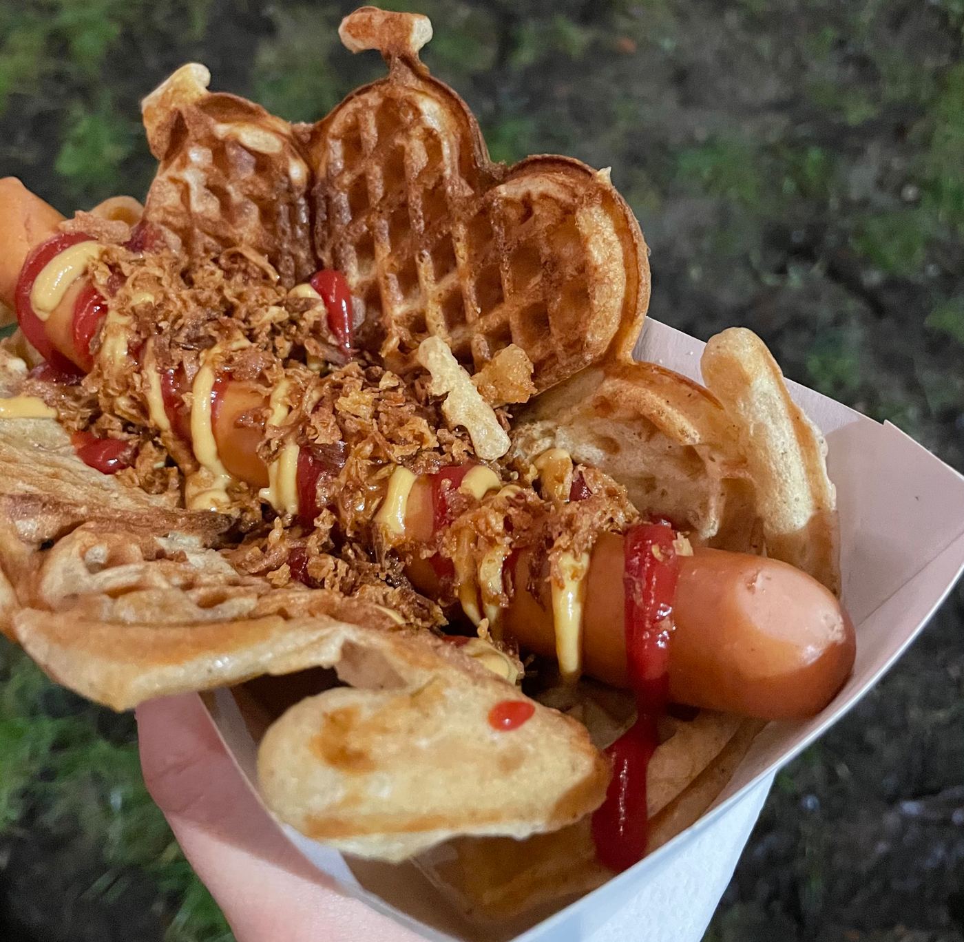 Moss waffle: a hot dog with ketchup, mustard and crispy onions wrapped in a heart-shaped waffle