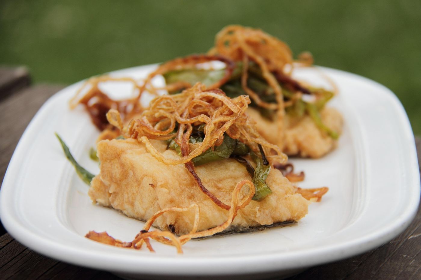 Bacalao, salted cod served with peppers and crispy onions