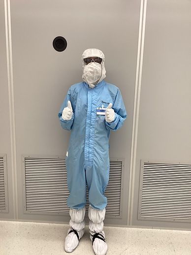 Anthony Aiyedun in cleanroom fab suit at NXP