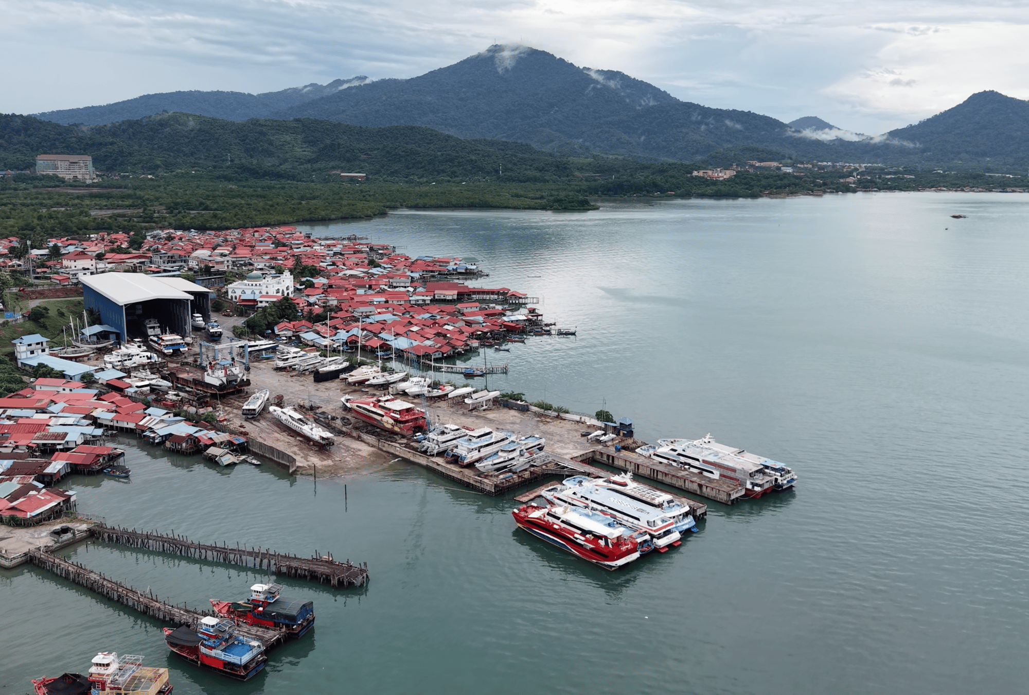 Aerial view of Northern Shipyard on Langkawi, beside a fishing village