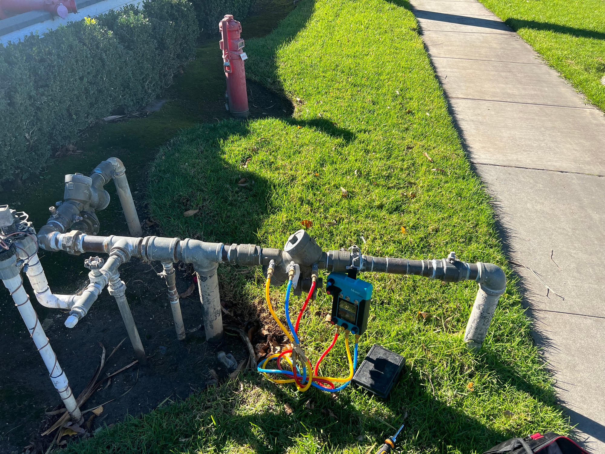 Mako test gauge on backflow assembly near fire hydrant