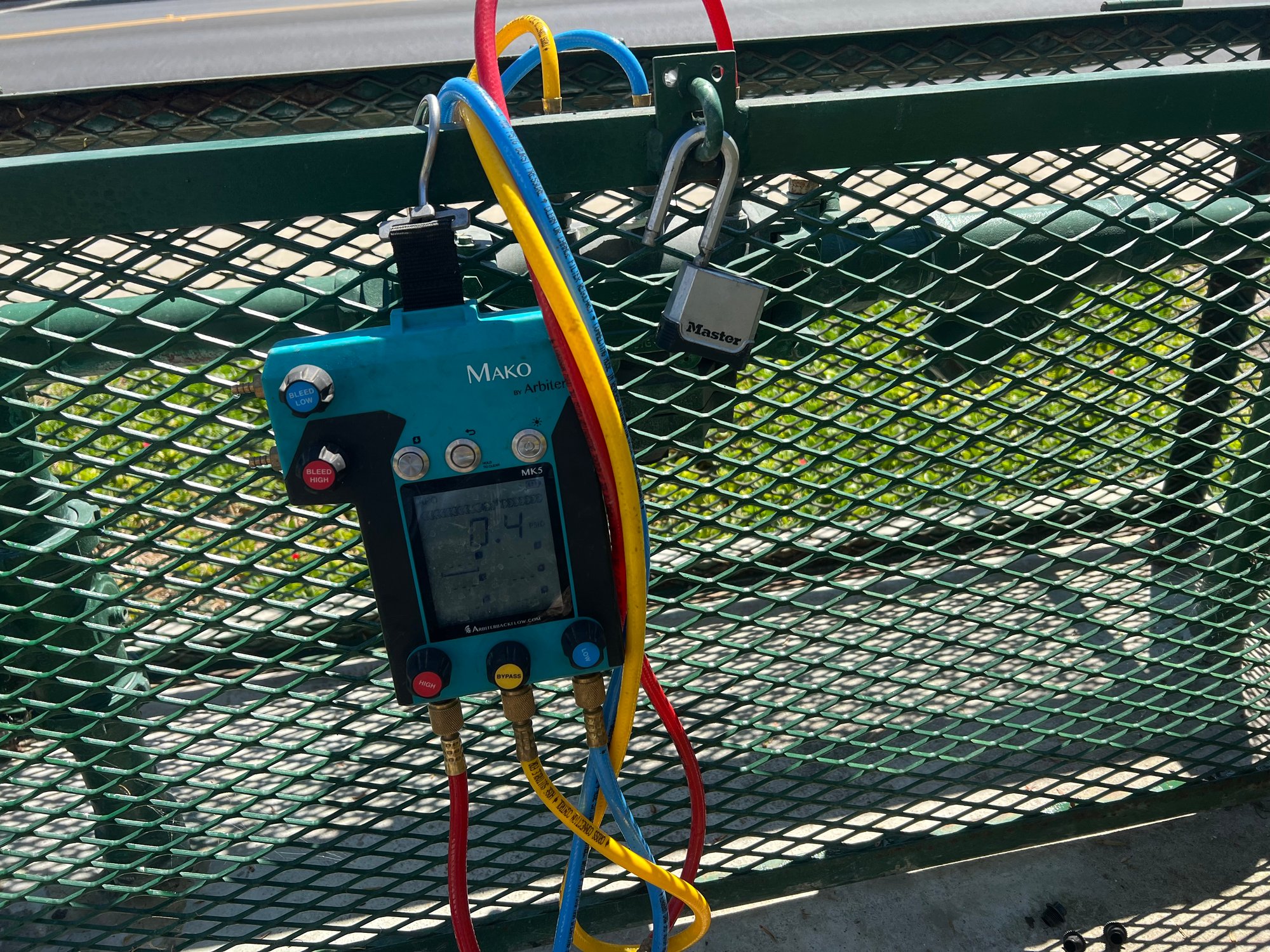 Compliance test on backflow assembly inside green security cage
