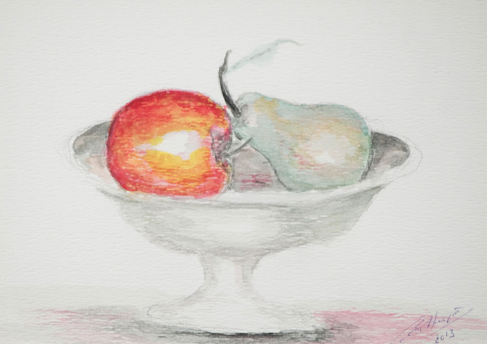 Appel en peer in fruitschaal