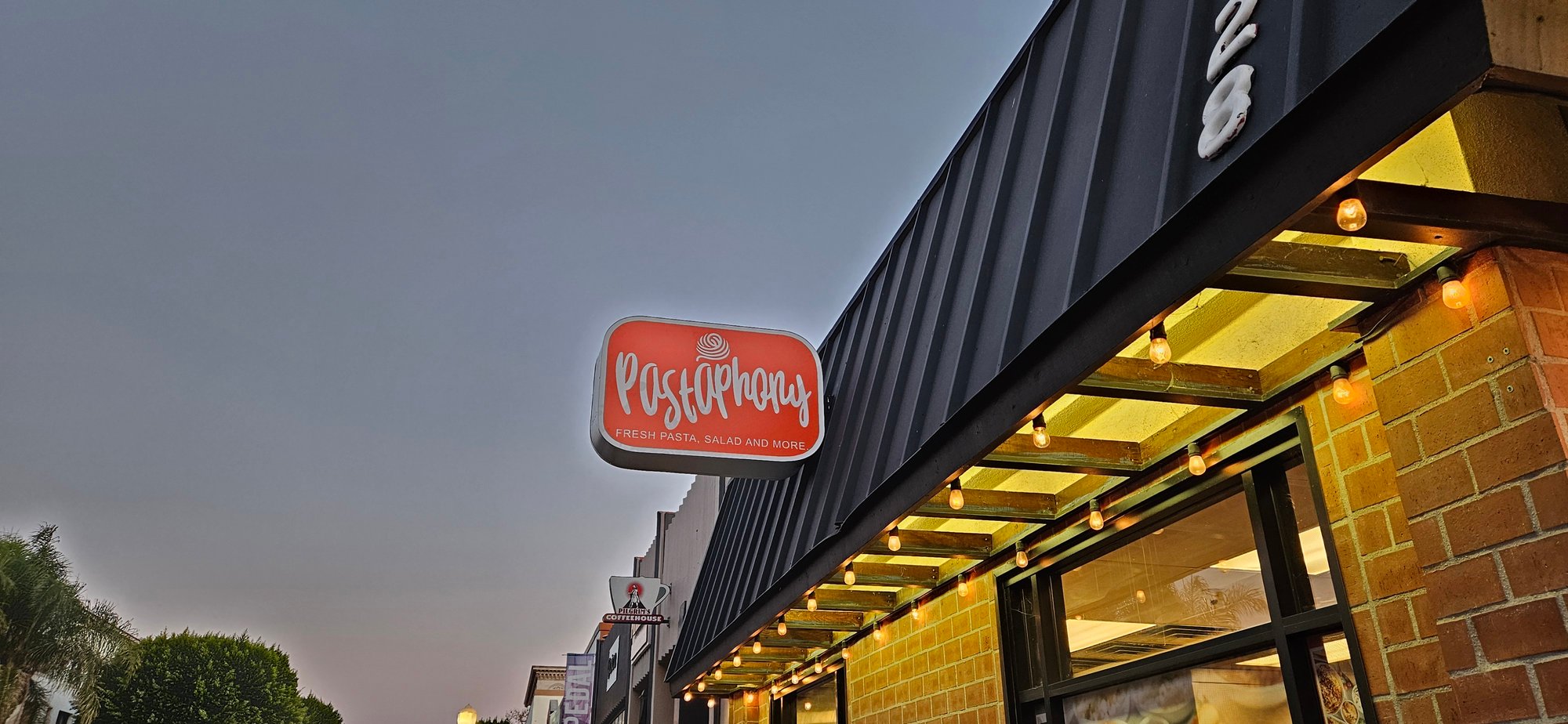 Illuminated projecting marquee sign for restaurant installed by Anaheim Signs in Fullerton Ca.