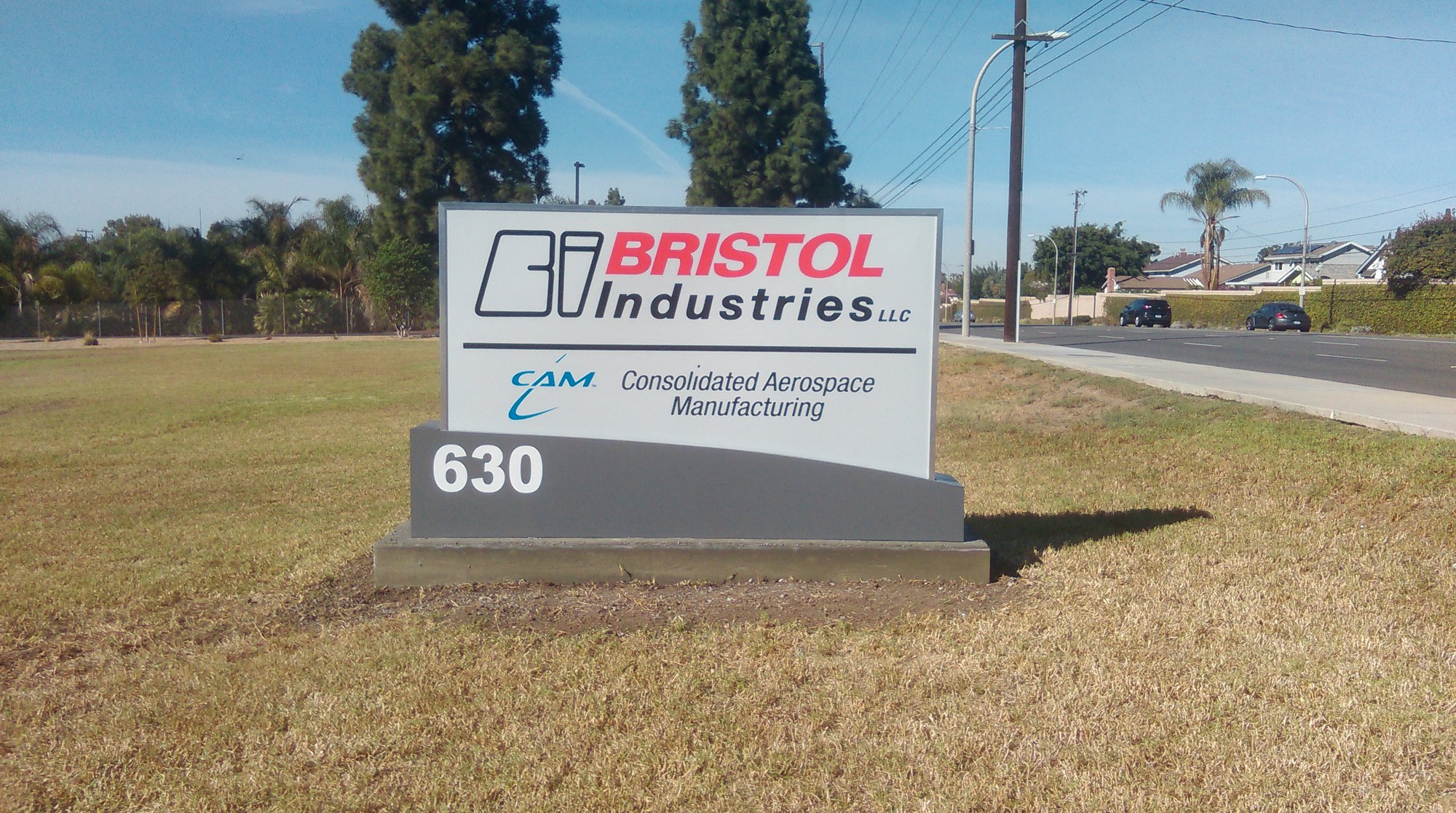 Custom monument sign with address numerals for Orange County business park