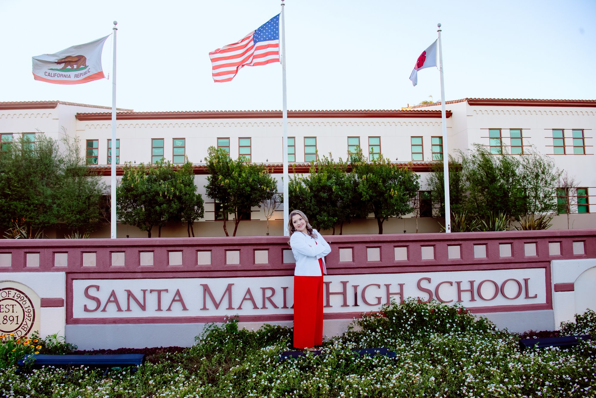 Maribel Aguilera at Santa Maria High School with flags