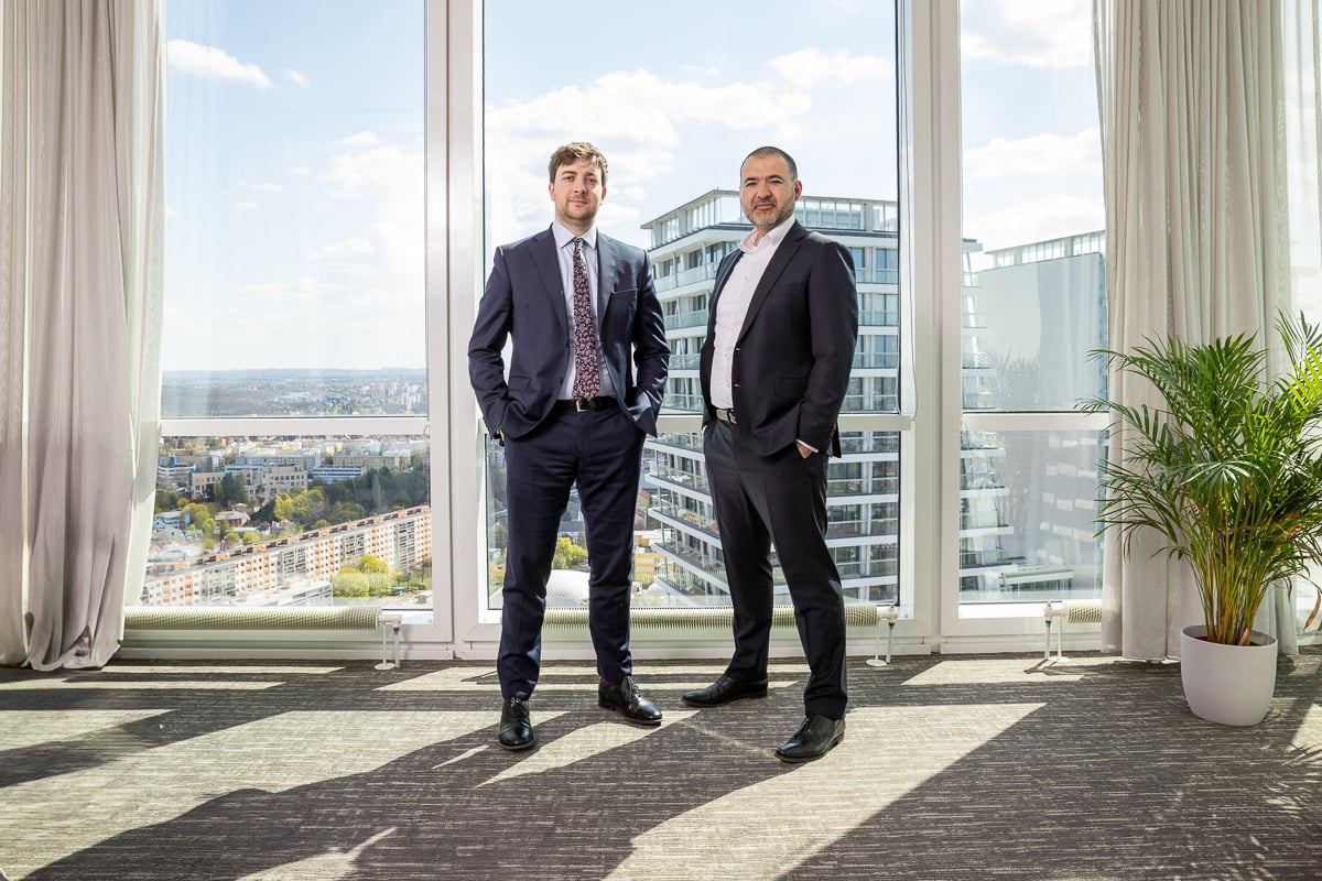 PEERS criminal defense attorneys in formal attire at Prague office