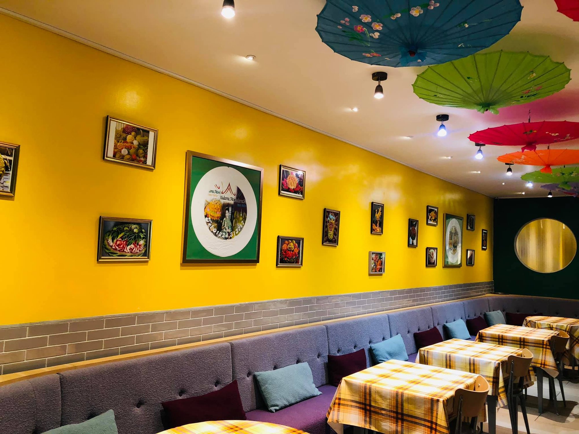 Bright yellow walls and cosy seating
