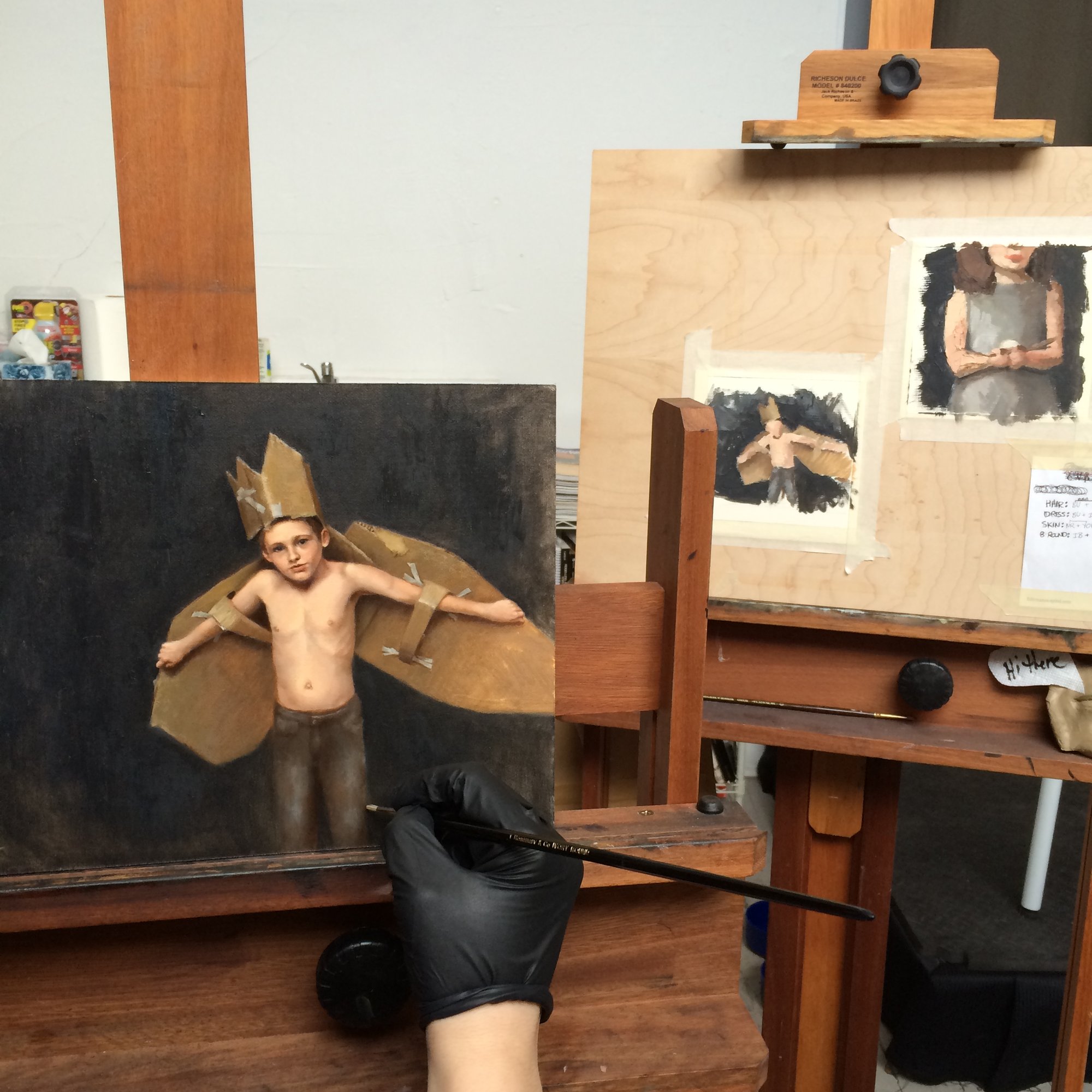 Alex Bauwens painting in her studio