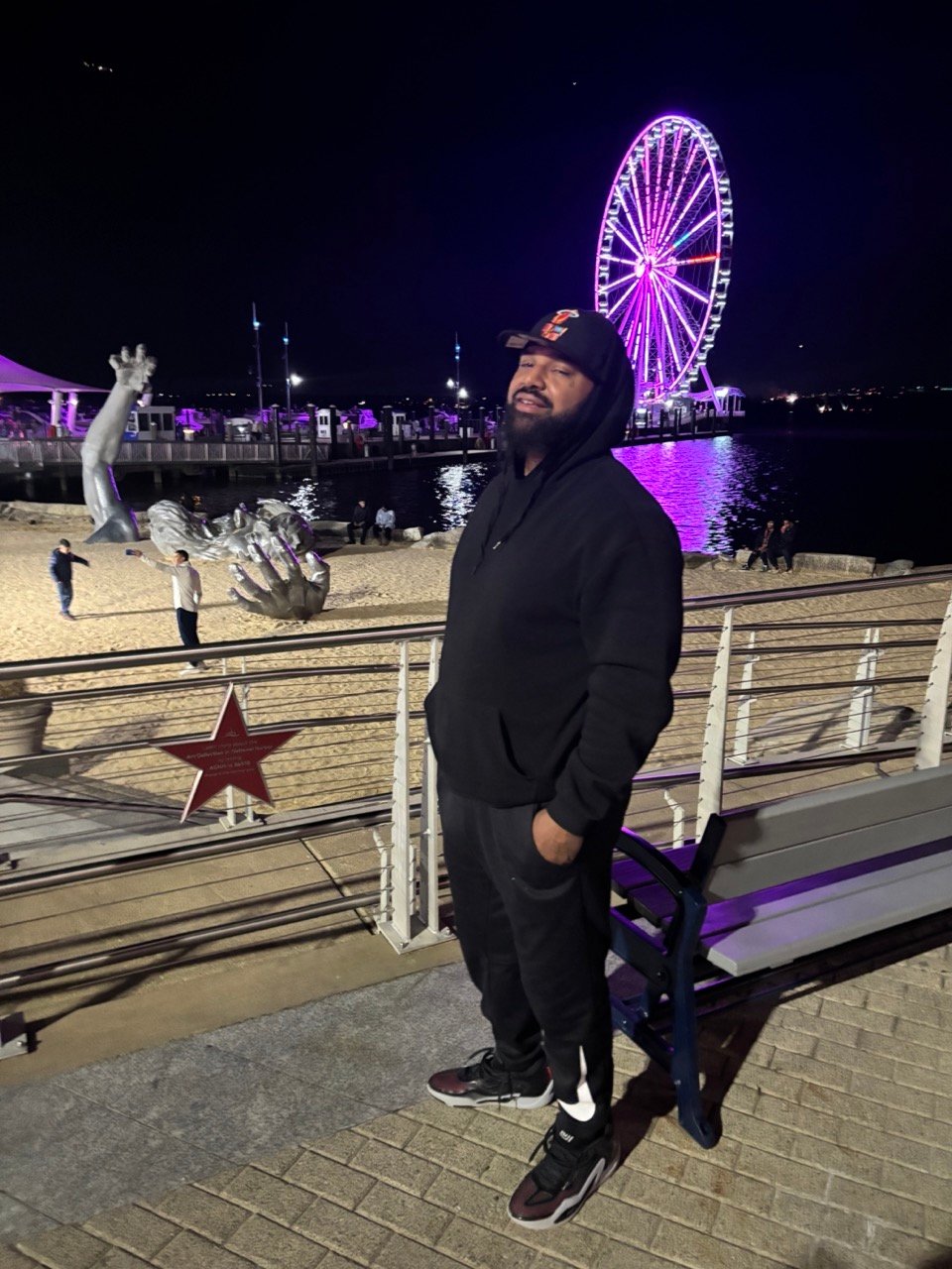 Eric at National Harbor at night