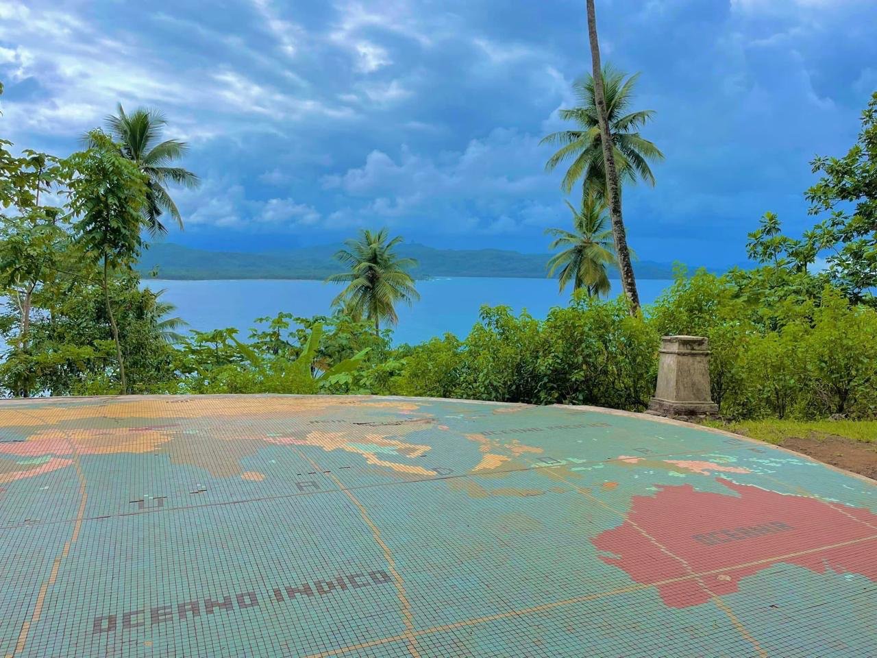 The Equator marker on Ilhéu das Rolas, with the monument standing between the northern and southern hemispheres