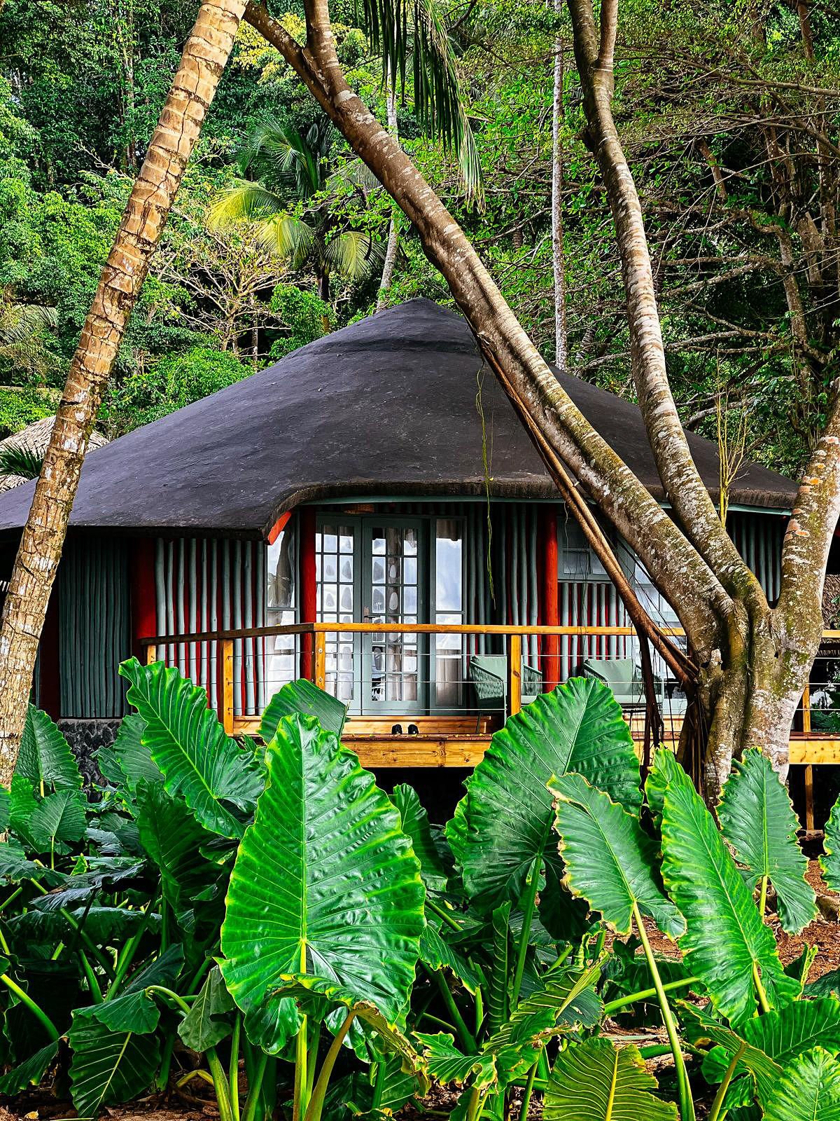 Sea View Bungalow exterior with its terrace overlooking the ocean at Bom Bom
