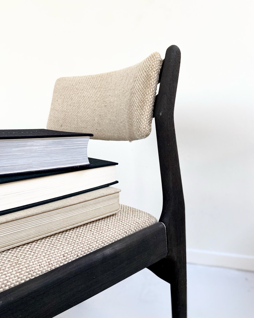 Blackened dining chairs in the Black Vintage Collection