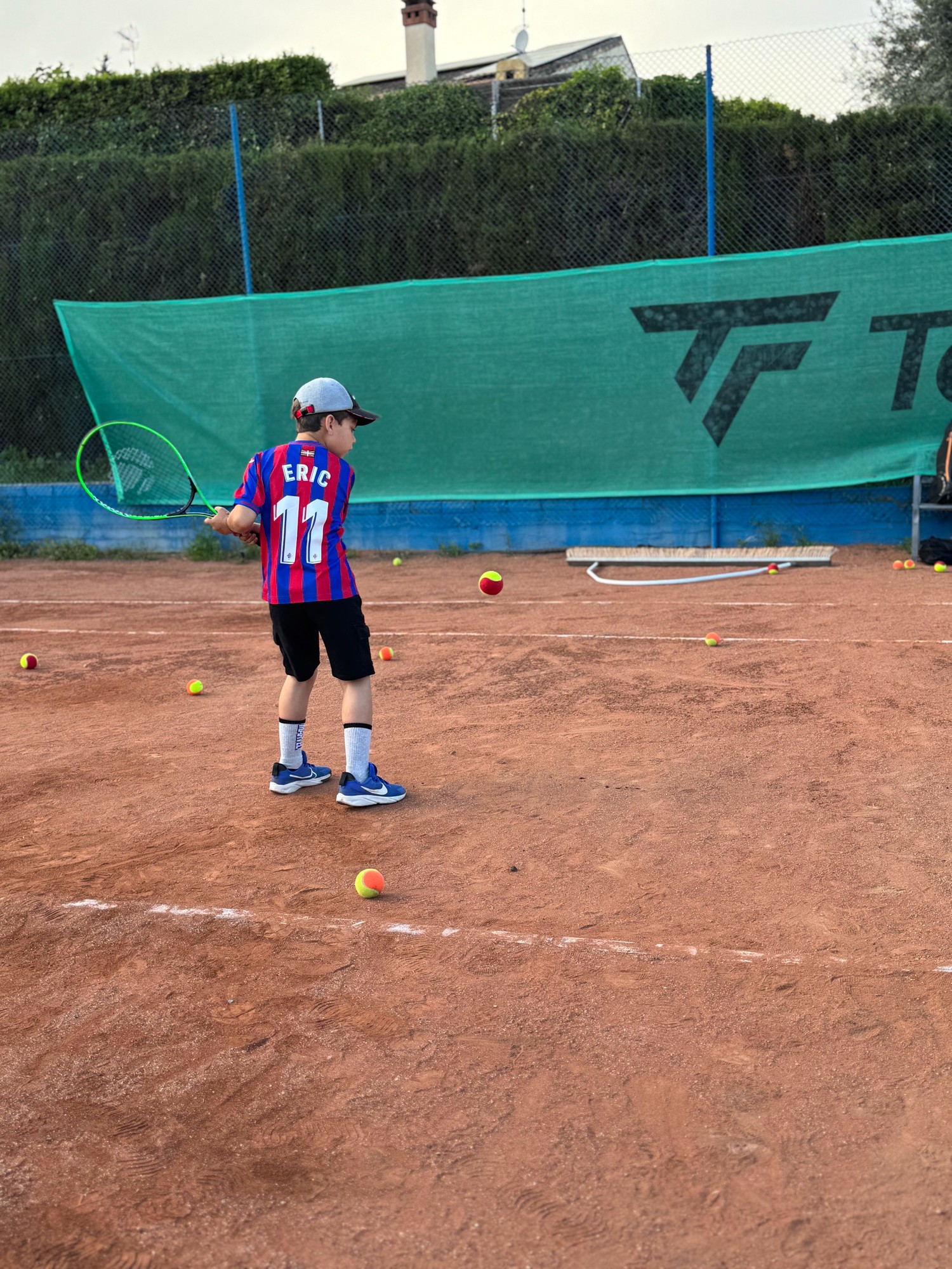 Grup d'escola de tennis