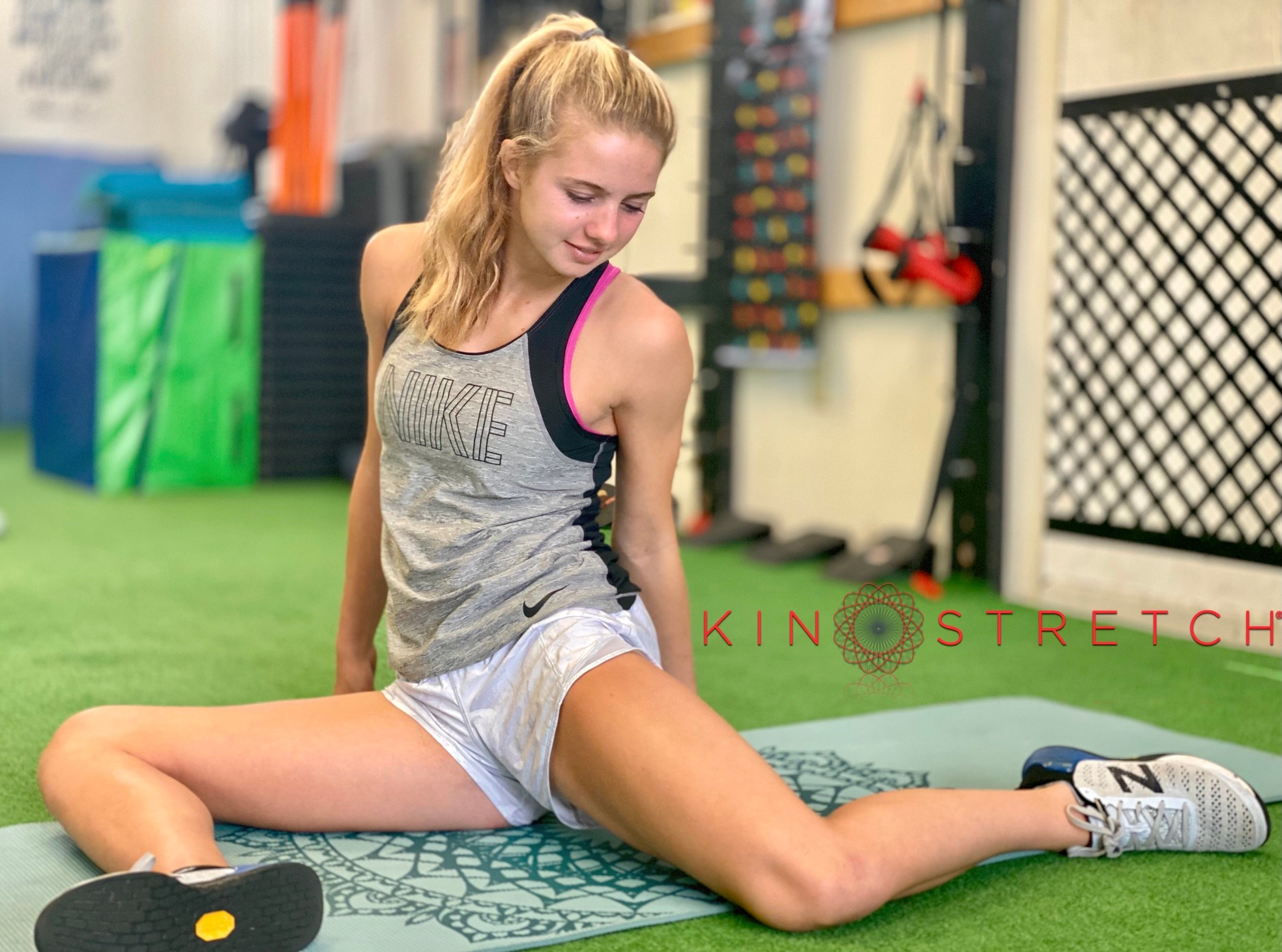 Athletes using sticks for controlled mobility work