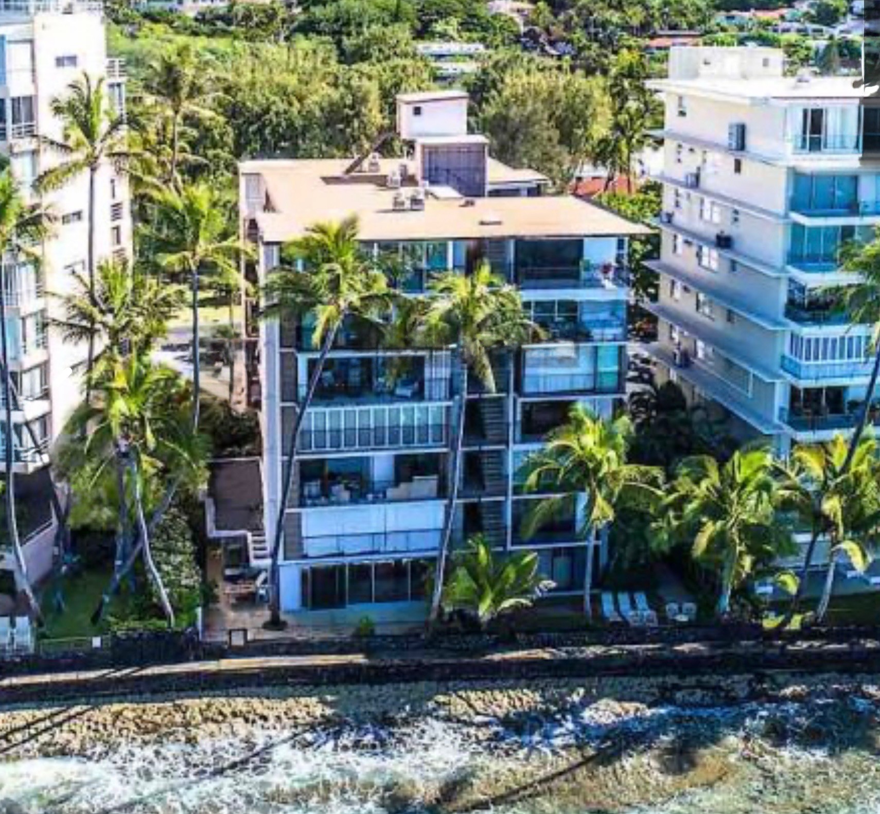 2987 Kalakaua — Glass oceanfront building from above