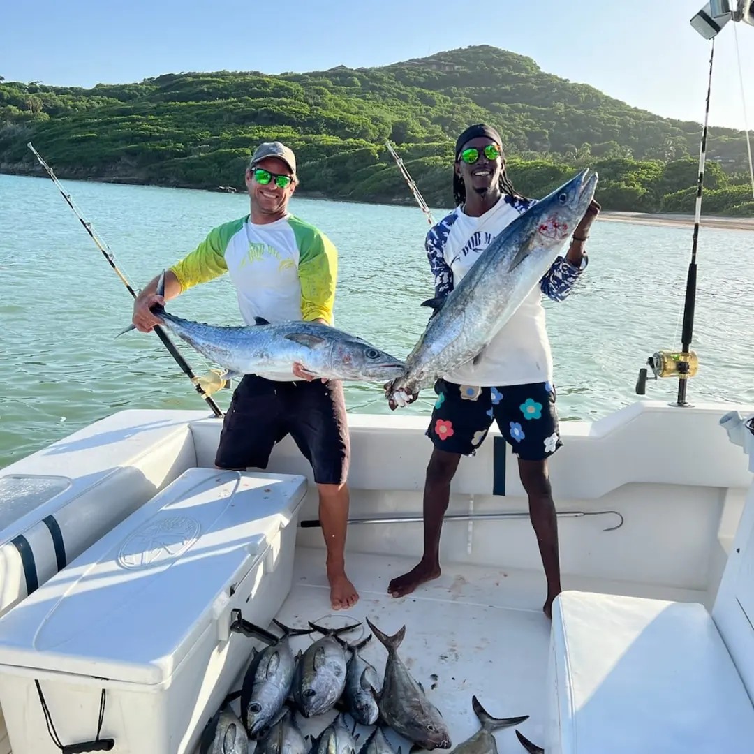 Kingfish double hook-up at sunrise