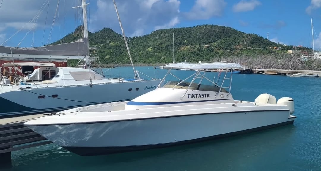 The Contender 36 Fisharound charter boat at the marina