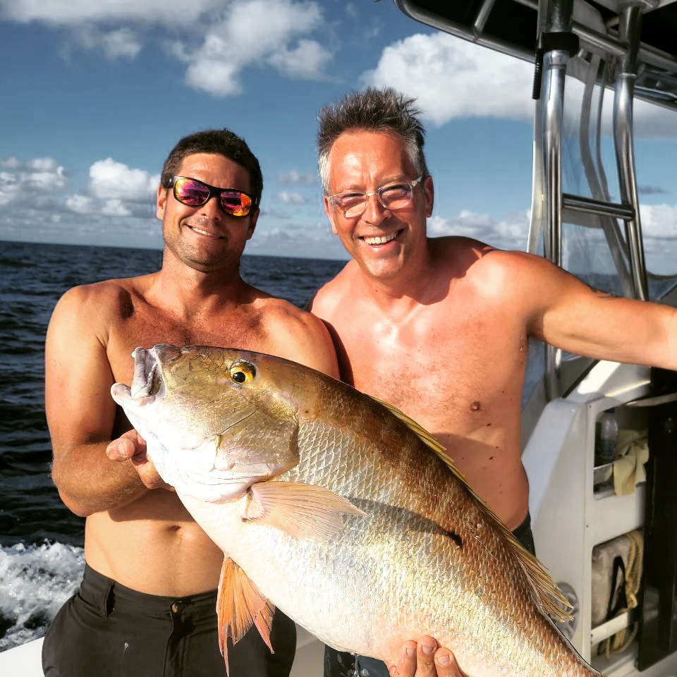 Smiles all round with a big amberjack