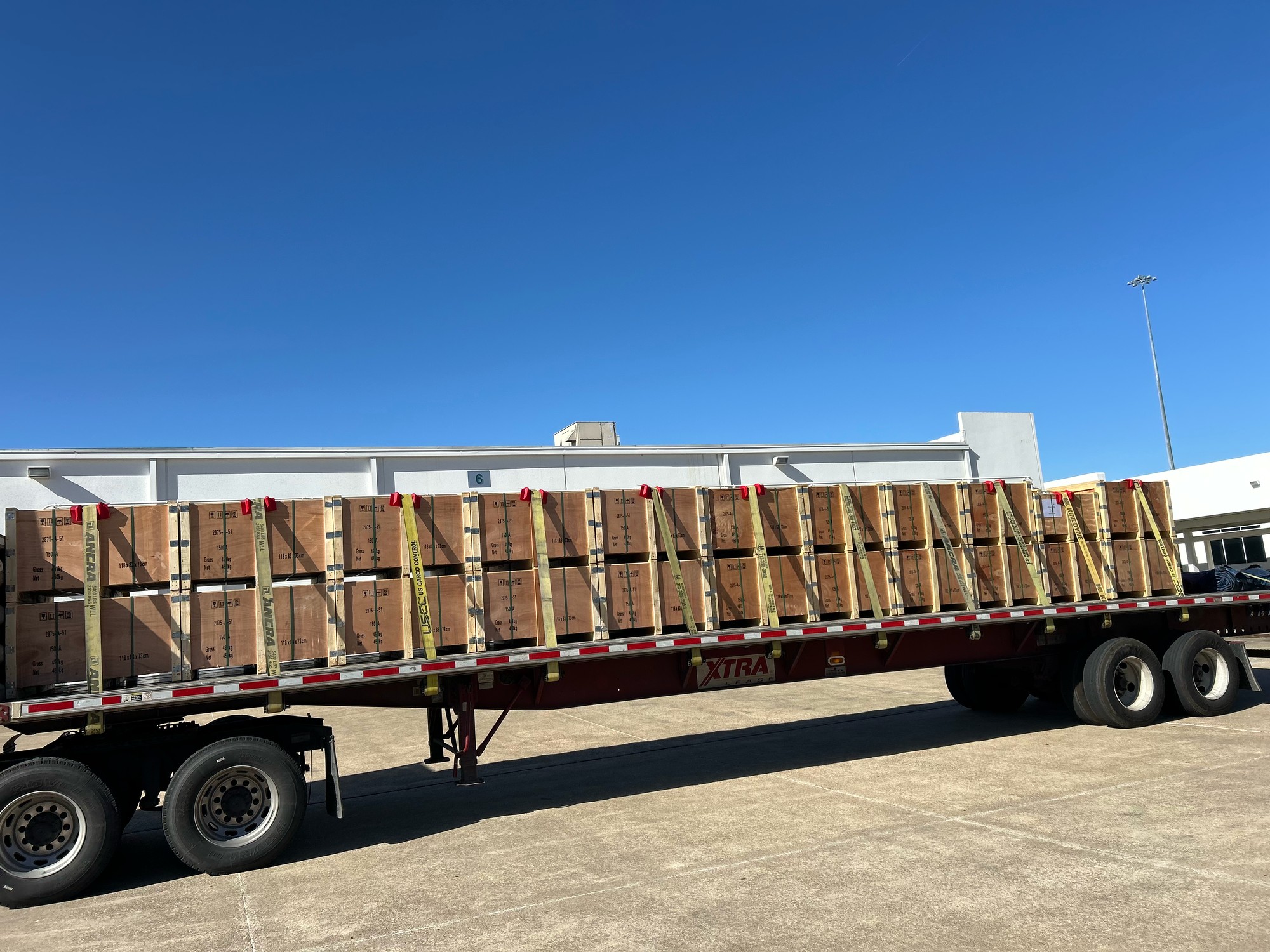 Building materials loaded and secured on flatbed