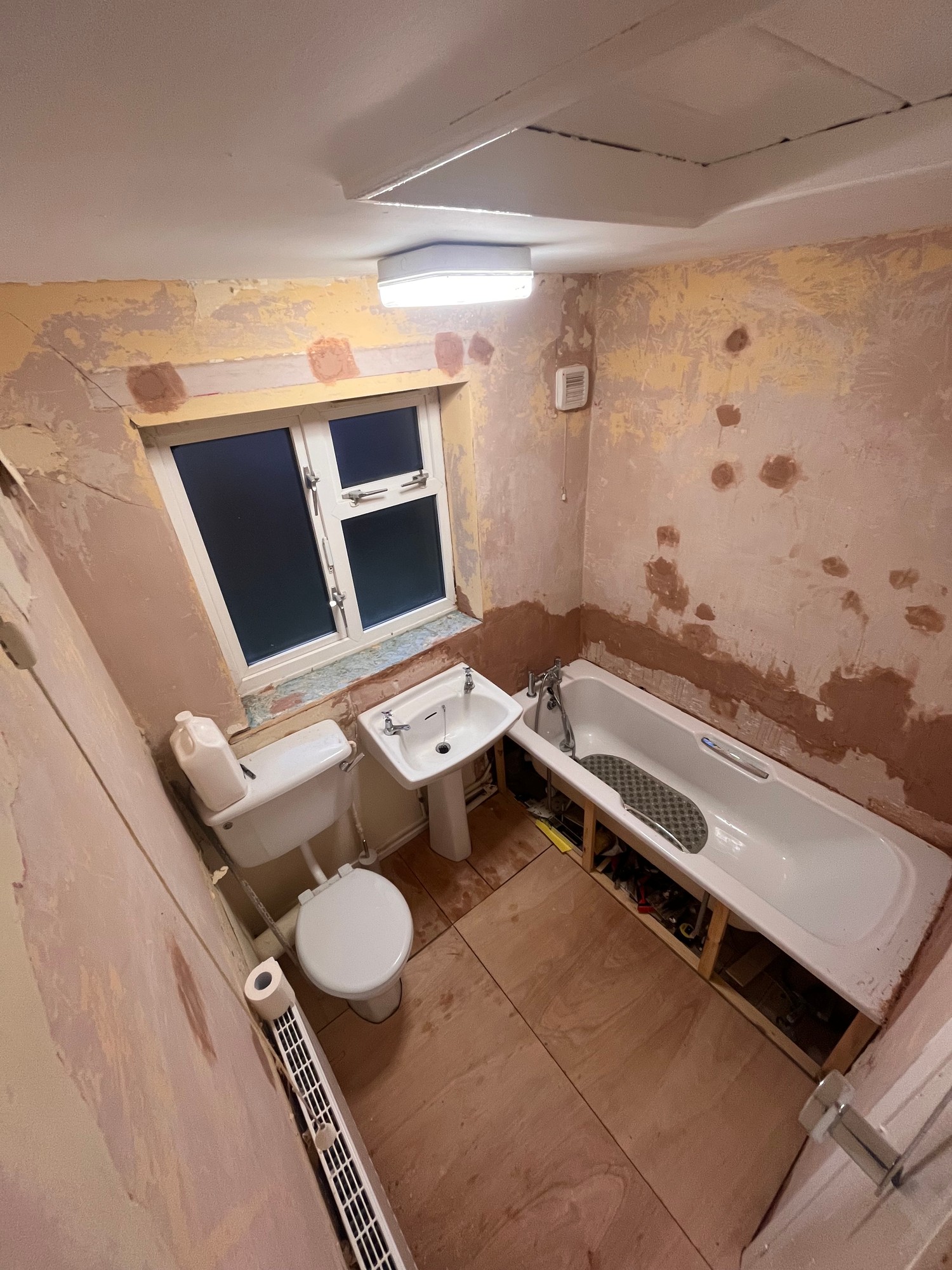 Bathroom with unfinished walls before renovation work