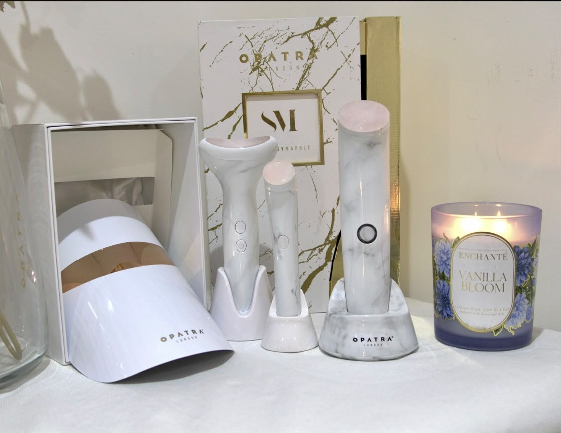 Opatra London devices including LED mask, DermisoniC II and marble wand — luxury technology at Yves Beauty