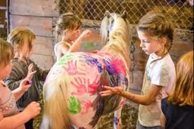 Kids having creative fun at horse camp