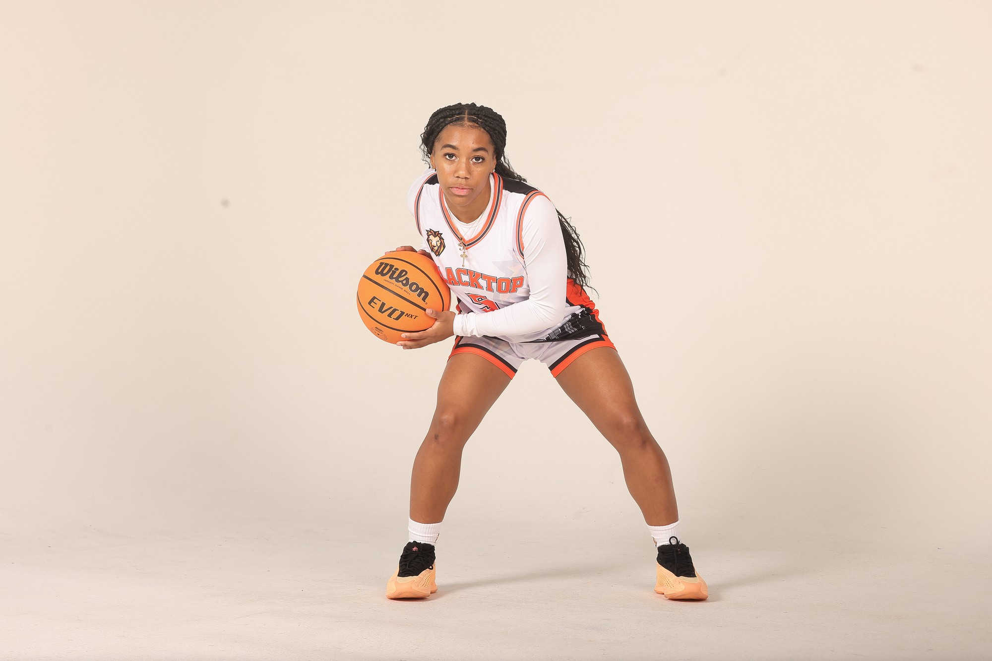 Blacktop player holding basketball
