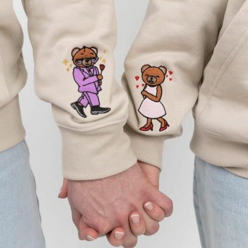 Elixs merch — detail výšivky