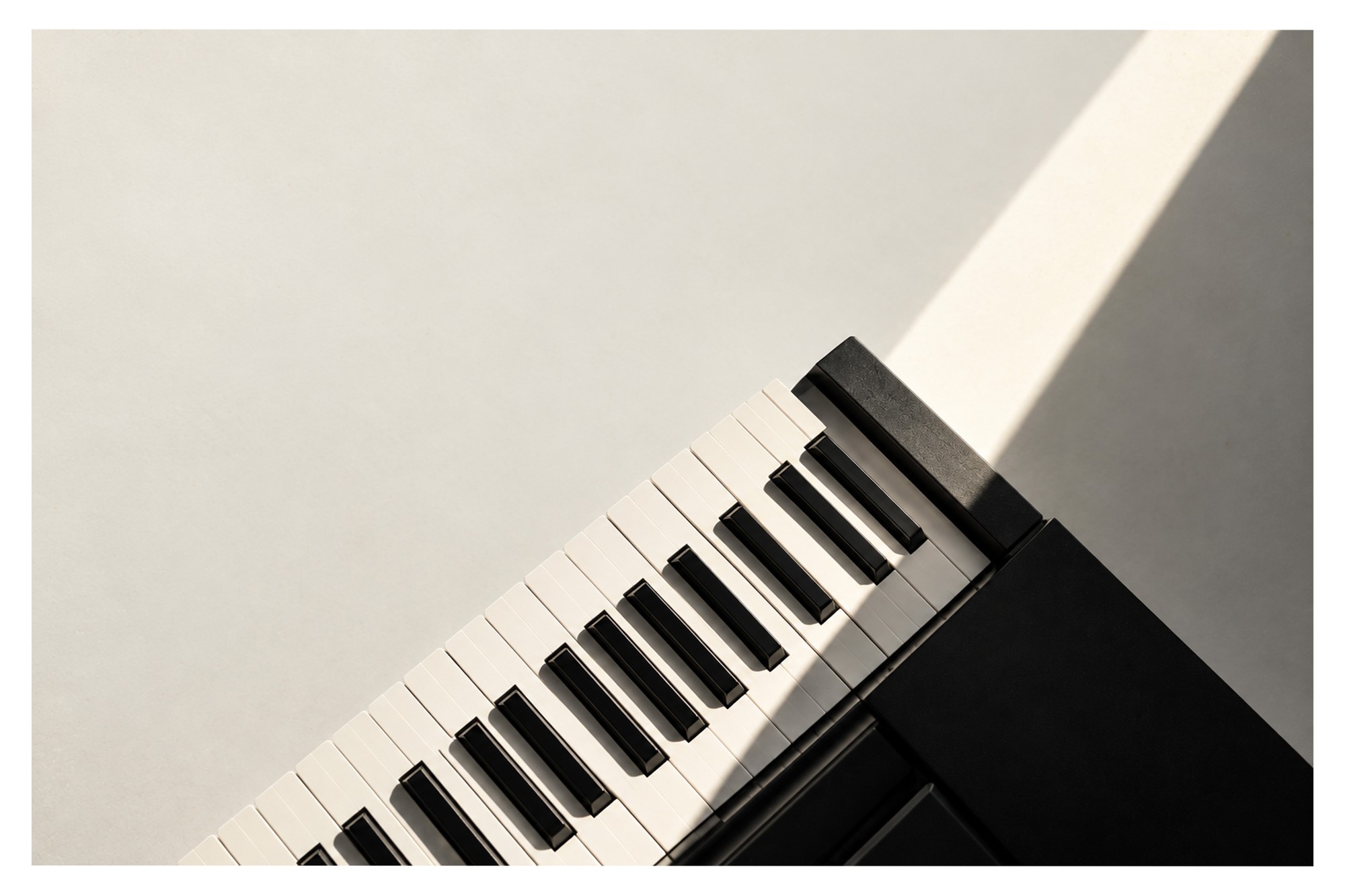 Piano keys in warm sunlight
