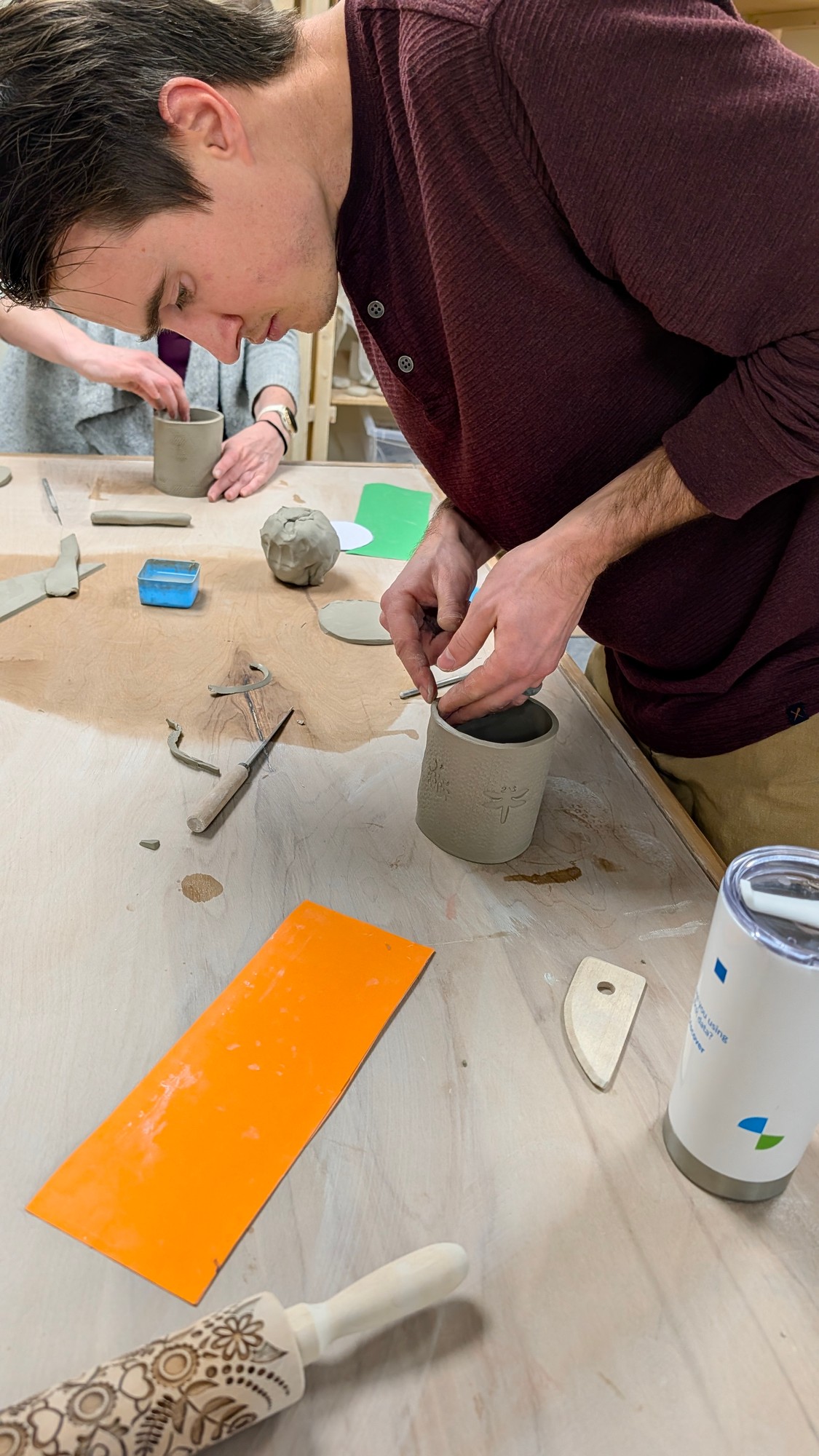 Handmade ceramic mugs waiting to be painted
