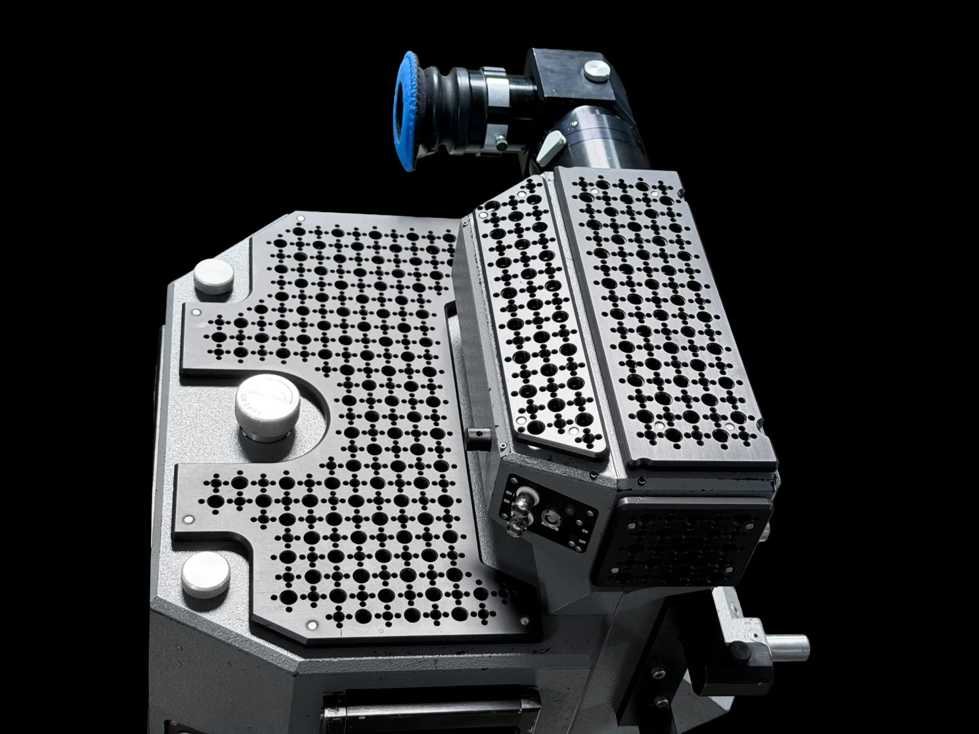 Perforated AKS mounting plates and viewfinder on the Ultra 70 camera