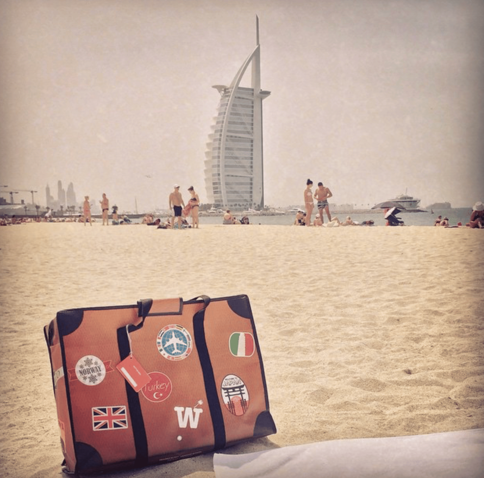 WISSHH Travel Bag in the vintage orange travel-stickers edition, on the road