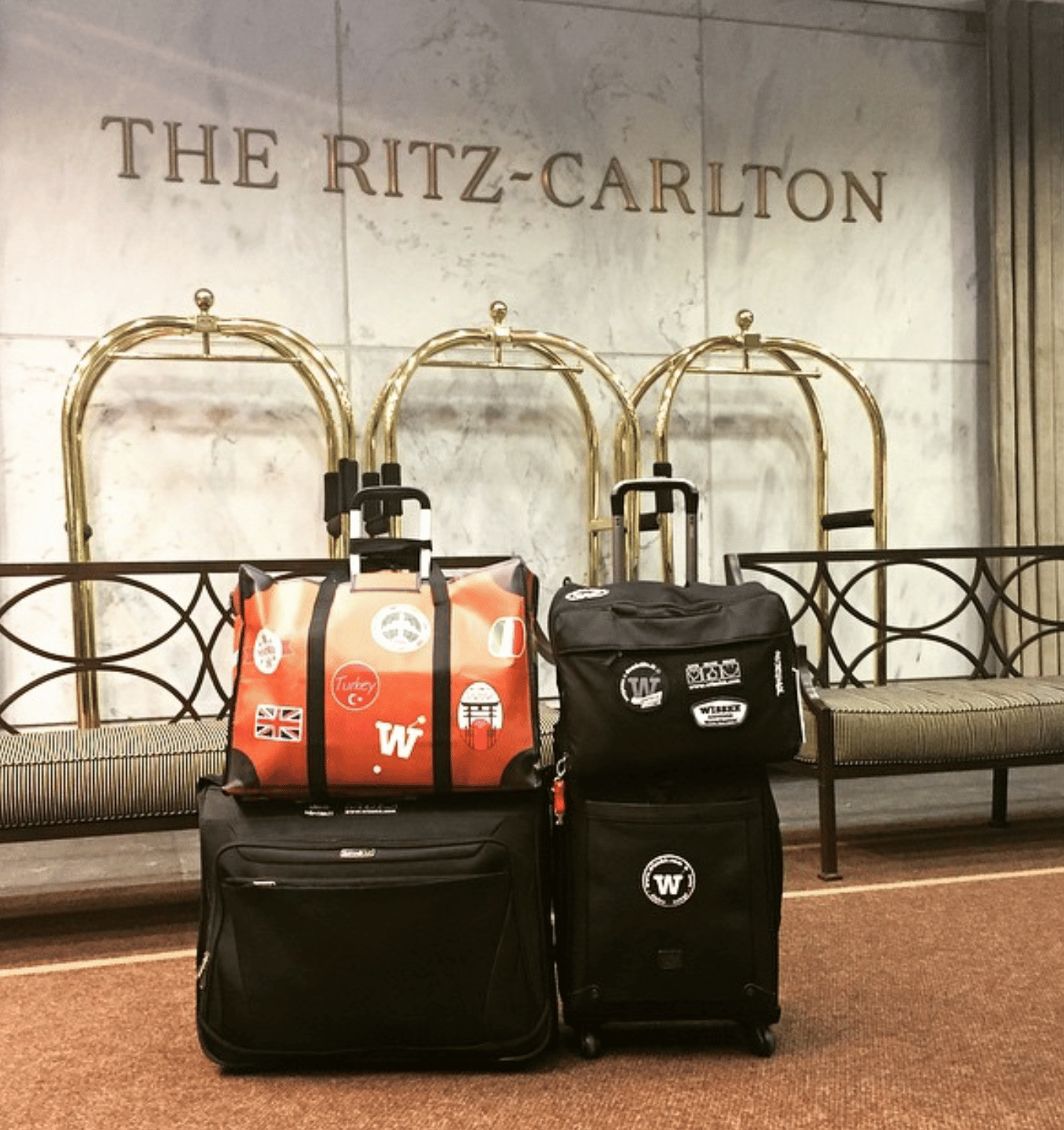 WISSHH Travel Bag in the vintage orange travel-stickers edition, on the road